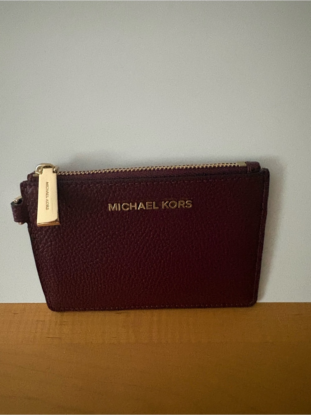 Michael Kors Burgundy Pebbled Leather Zip Card Holder with Gold Hardware